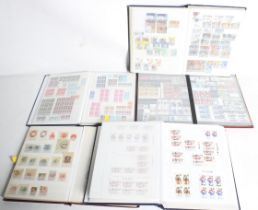 A collection of GB and regional stamps in five albums.