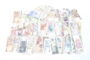 Approximately three hundred 20th century world banknotes.