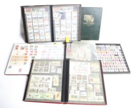 A collection of five albums of GB and commonwealth stamps.