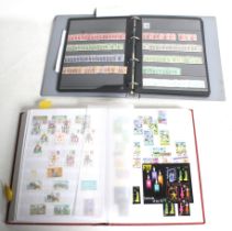 A collection of GB Regionals and Commonwealth stamps in two albums.