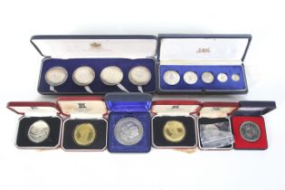 A collection of assorted GB coins and medallions.