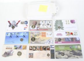Twenty eight assorted first day coin covers. Including £5, £2, £1 & 50p examples.
