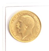 A 1913 half sovereign coin.