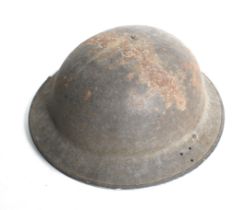 A WWII British Army Home Front helmet, dated 1941.