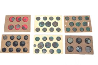 A collection of 76 bronze Roman coins.