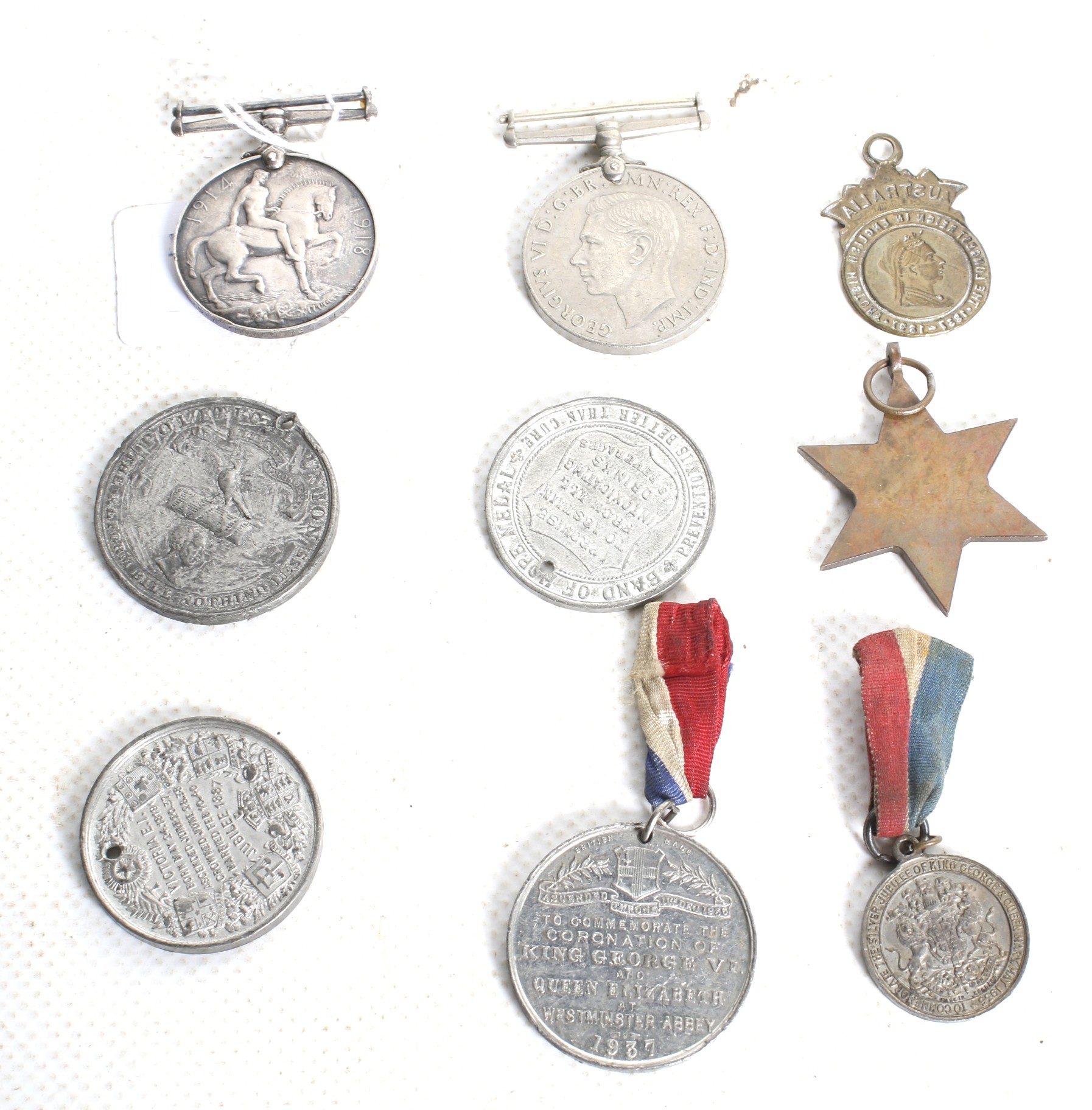 A group of WWI and WWII medals and other tokens. - Image 2 of 2