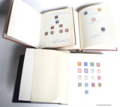 A collection of early GB and Commonwealth stamps in three albums.
