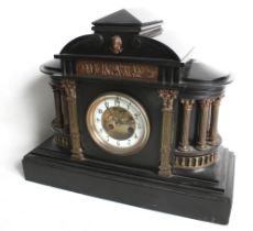 A 19th century French black slate mantel clock with columns.