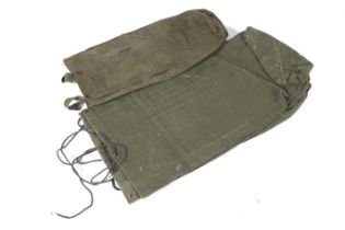 Three large militray landing bags and two smaller bags.