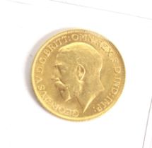 A 1912 sovereign coin.