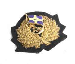 A 1920s Australind Steam.Shipping Company Ltd officer's cap badge.