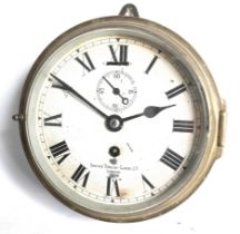 A mid-century Smiths English Clocks Ltd brass ships bulk head clock.