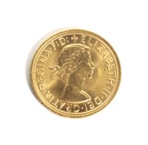 A 1966 Sovereign coin.