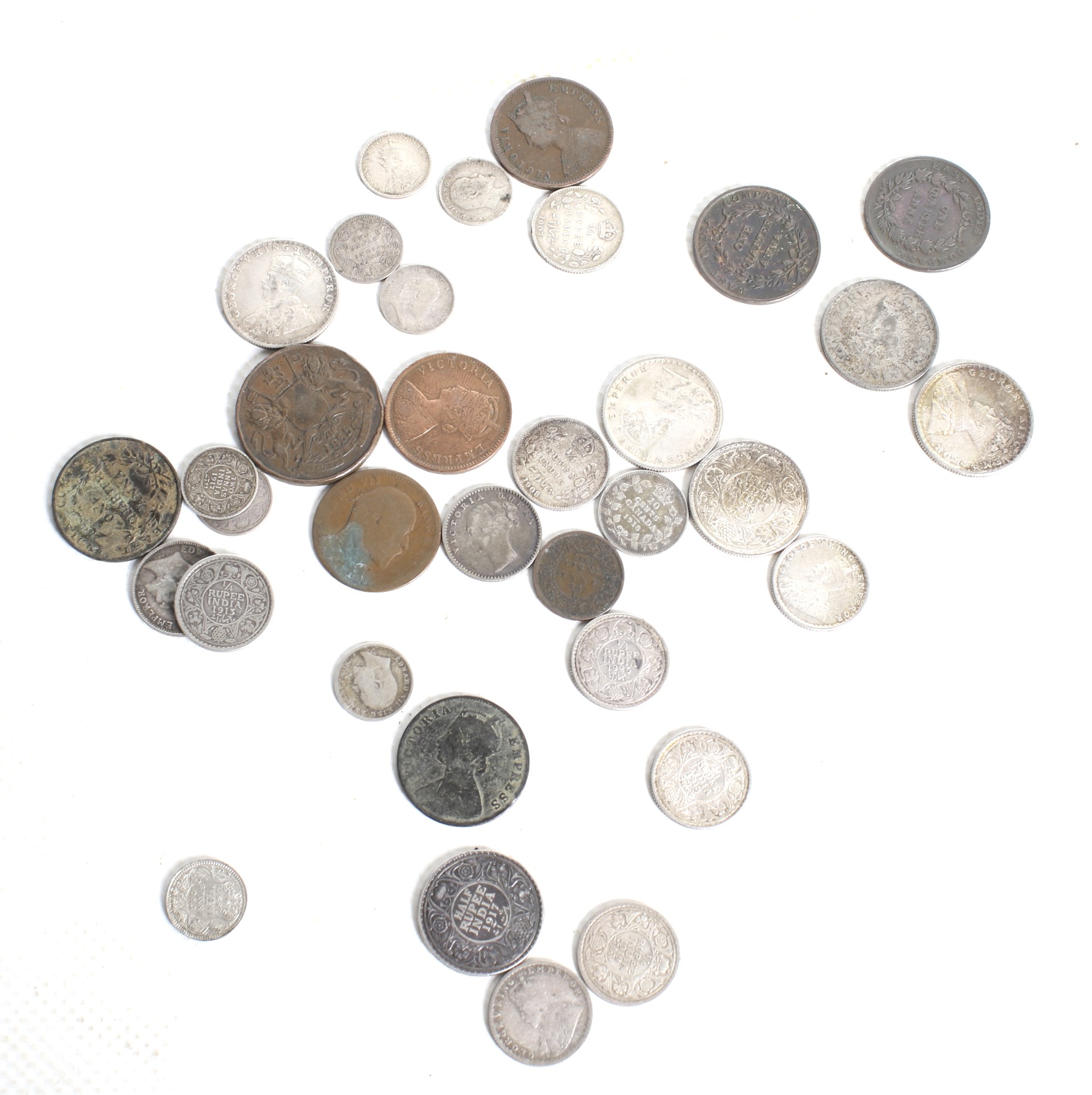 A collection of thirty-four Indian 19th and 20th century coins. - Image 2 of 2