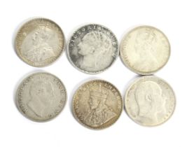 A group of six Indian Rupees coins. Dated 1835; 1840; 1880; 1910; 1912 and 1916.