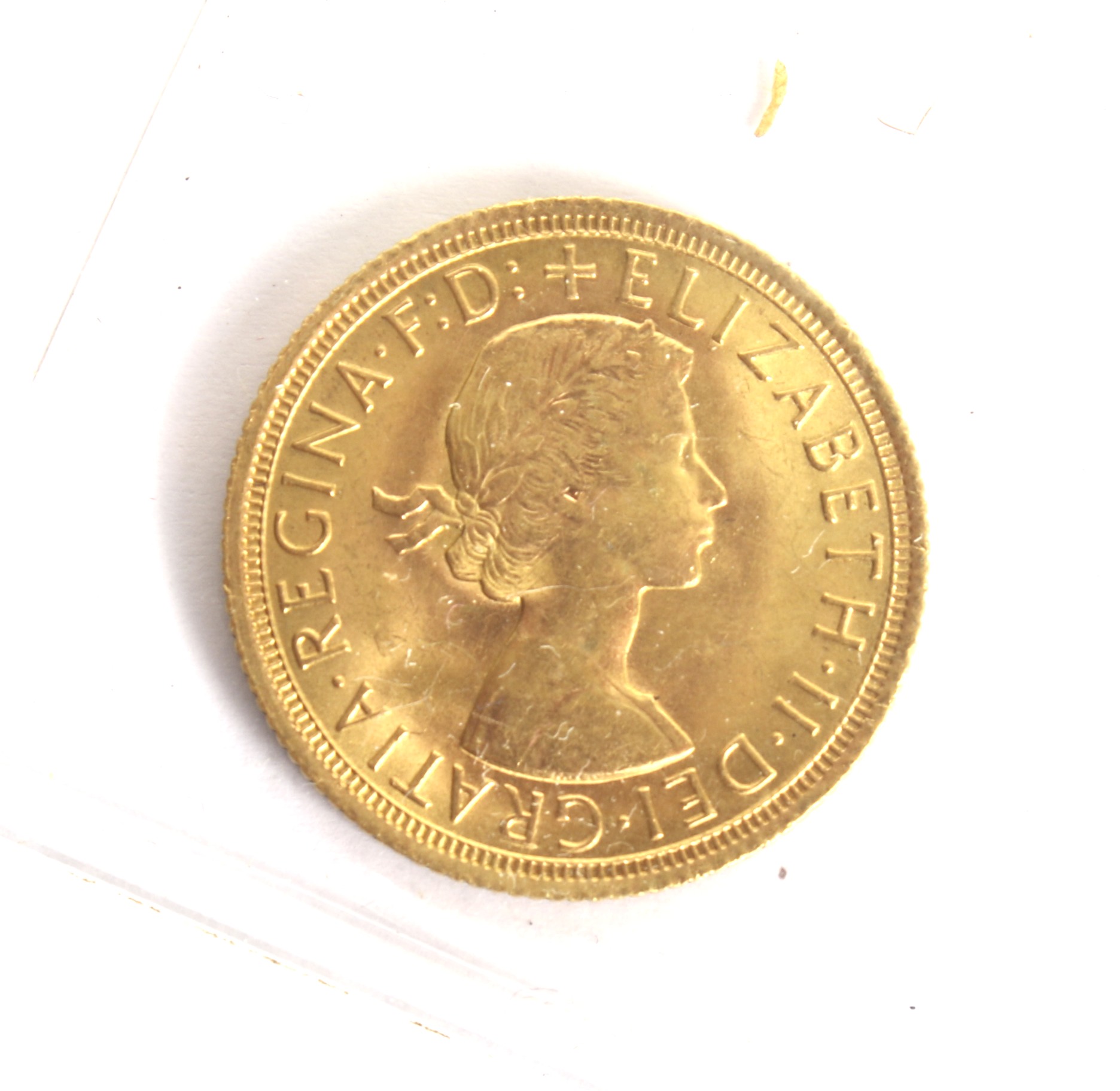 A 1966 sovereign coin.