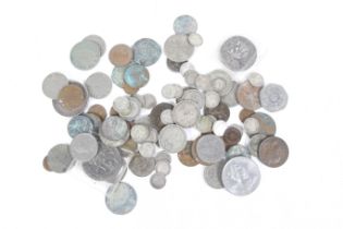 A group of assorted English coins.