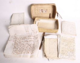 An early 20th century wicker bag of letters.