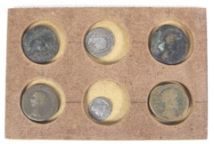 A small group of assorted Roman coins. Including four bronze and two silver.