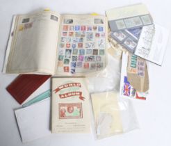 A mixed collection of worldwide stamps. Typical schoolboy collection noting China etc.