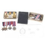 A collection of WWI and WWII medals and ephemera.