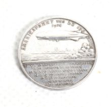 A silver 1924 Dr. Hugo Eckener Zeppelin commemorative medal.