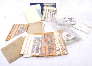 Bag of mixed GB and world stamps and First Day Covers. World collection including Germany.
