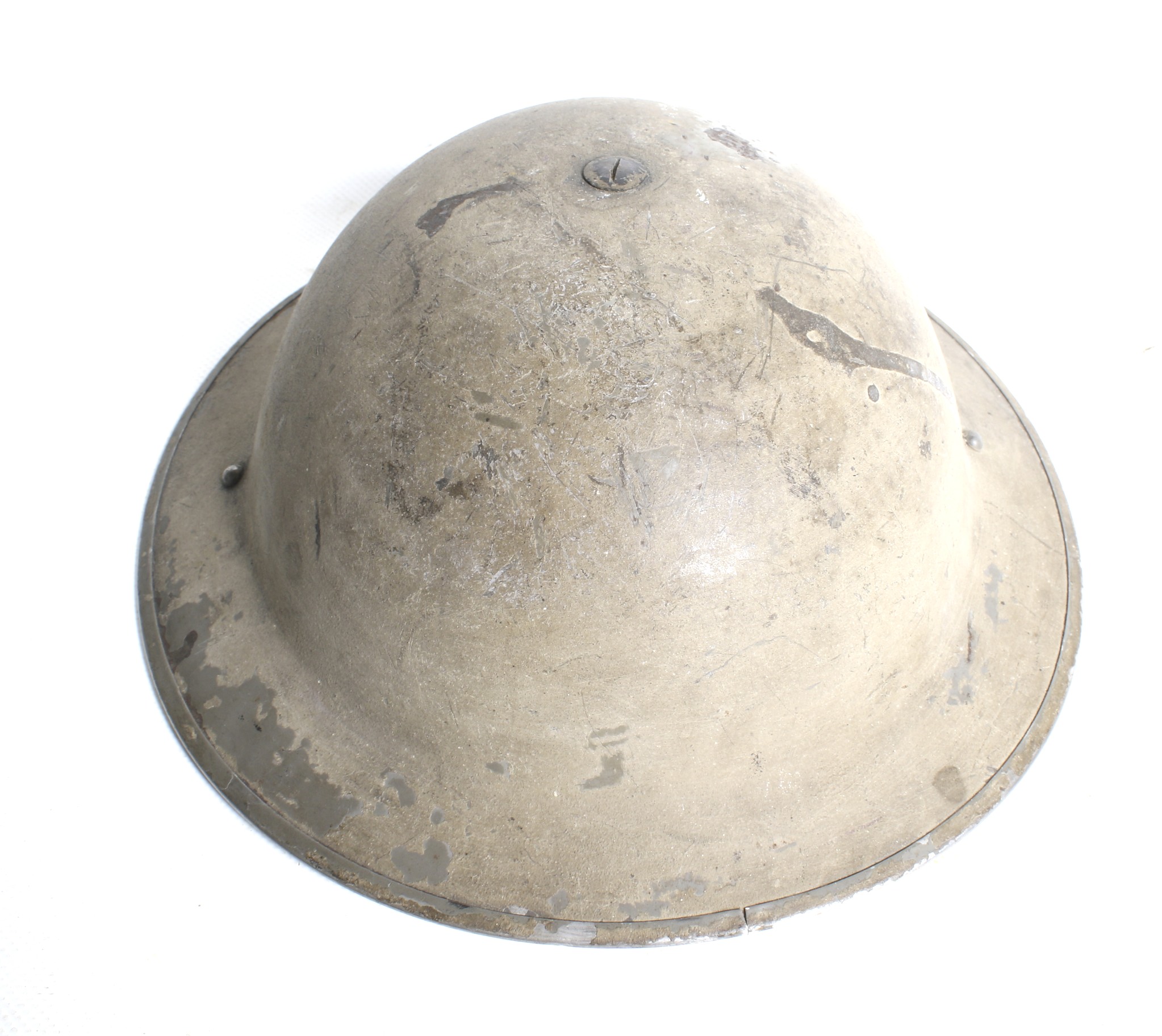 A WWII British Army Brodie helmet, dated 1940.