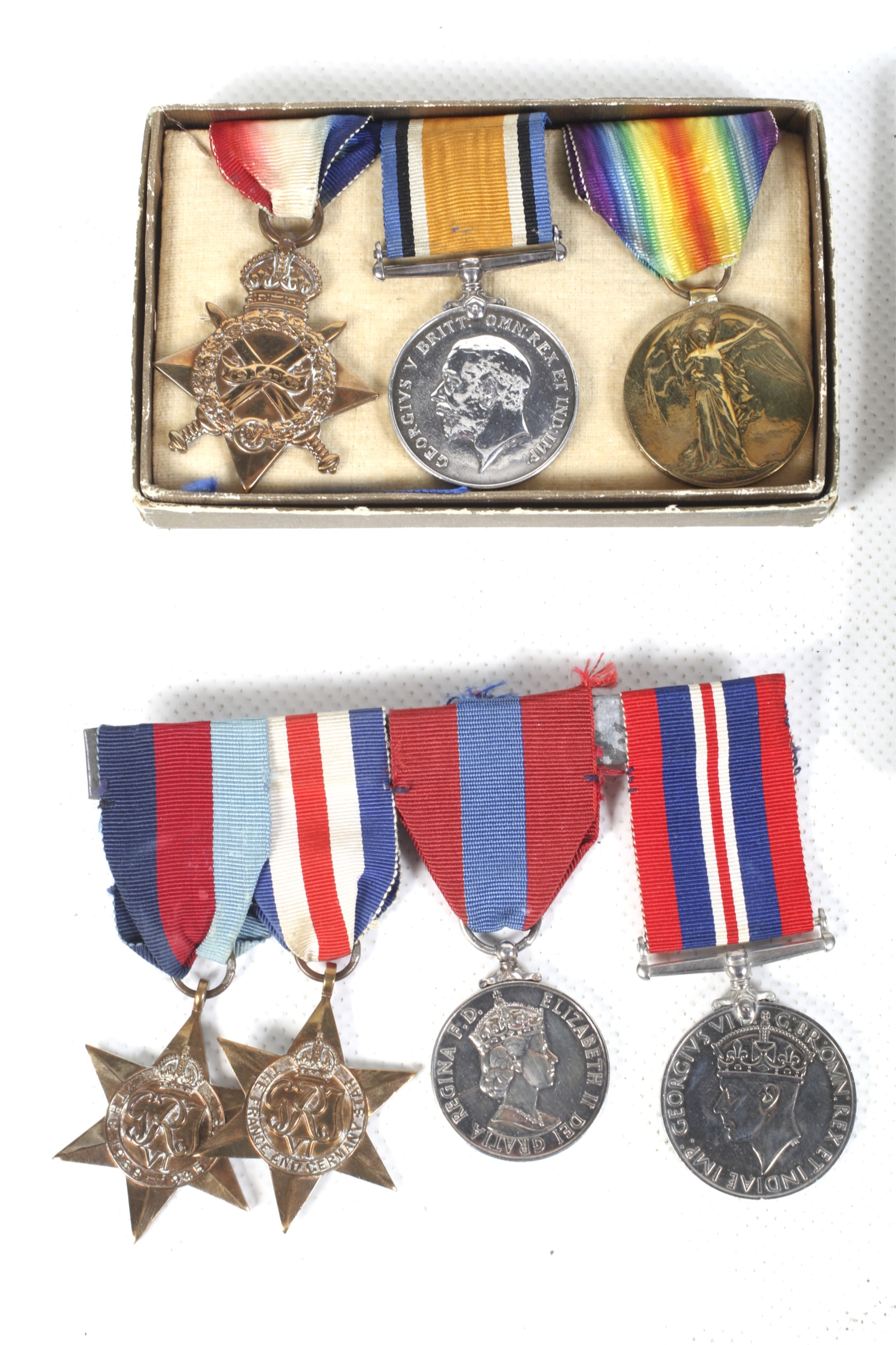A collection of WWI and WWII medals and ephemera. - Image 2 of 4