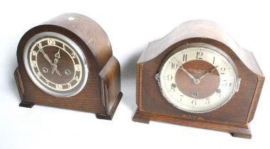 Two circa 1940s oak case striking mantel clocks.
