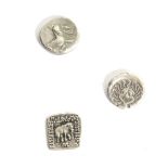 A group ot three Ancient Greek coins.