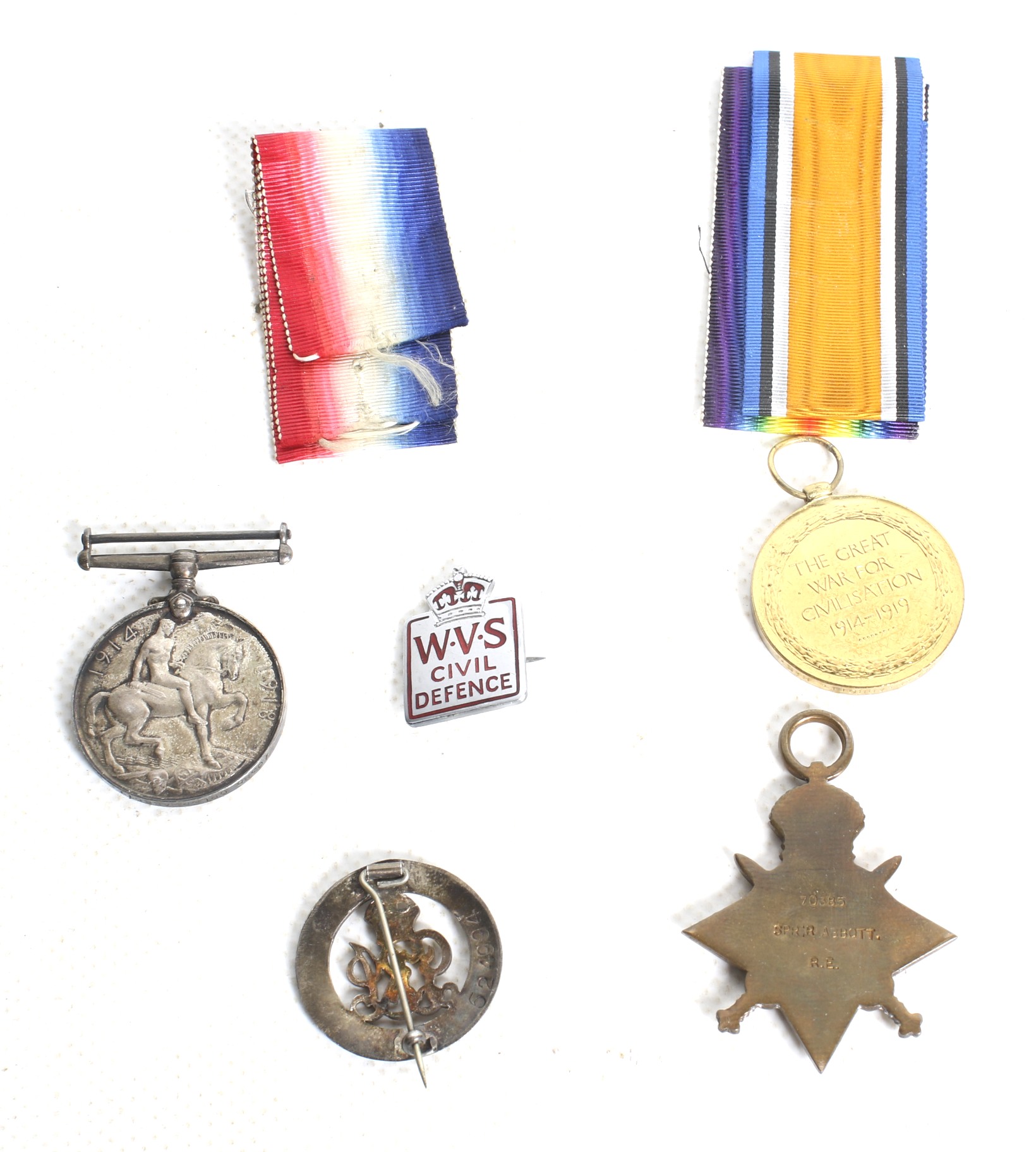 A set of three WWI medals and three badges. - Image 2 of 2