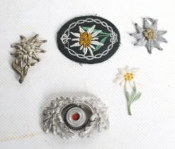 Five German WWII badges.