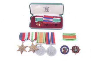 A group of WWII medals and others.