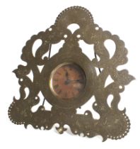 A 19th century strut clock with brass surround.