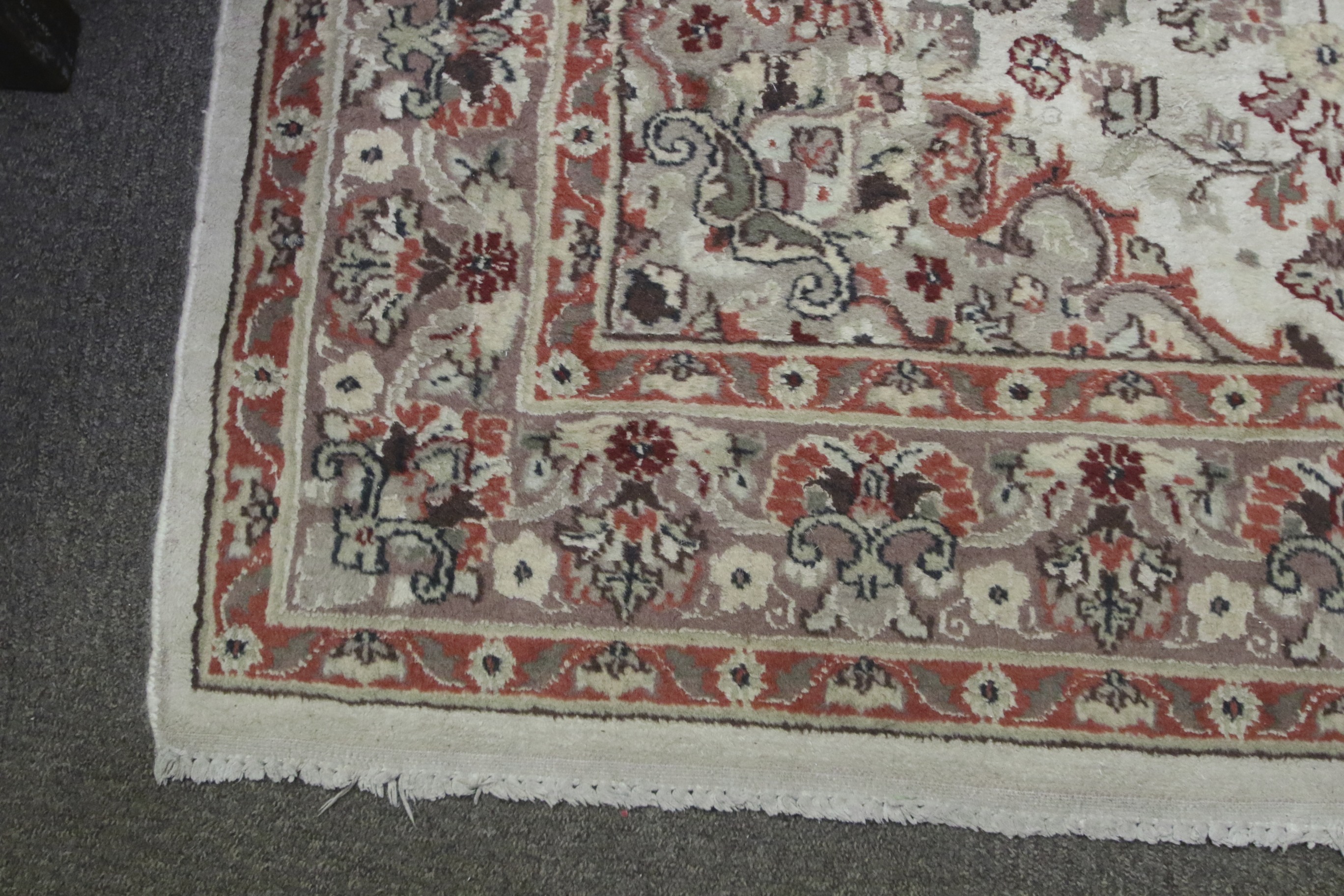 A 20th century rug. Cream ground rug with red decoration. - Image 5 of 5