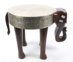 Contemporary carved hardwood elephant side table.
