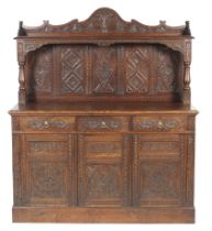 A carved oak sideboard dresser.