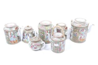 Seven famille rose teapots. c.