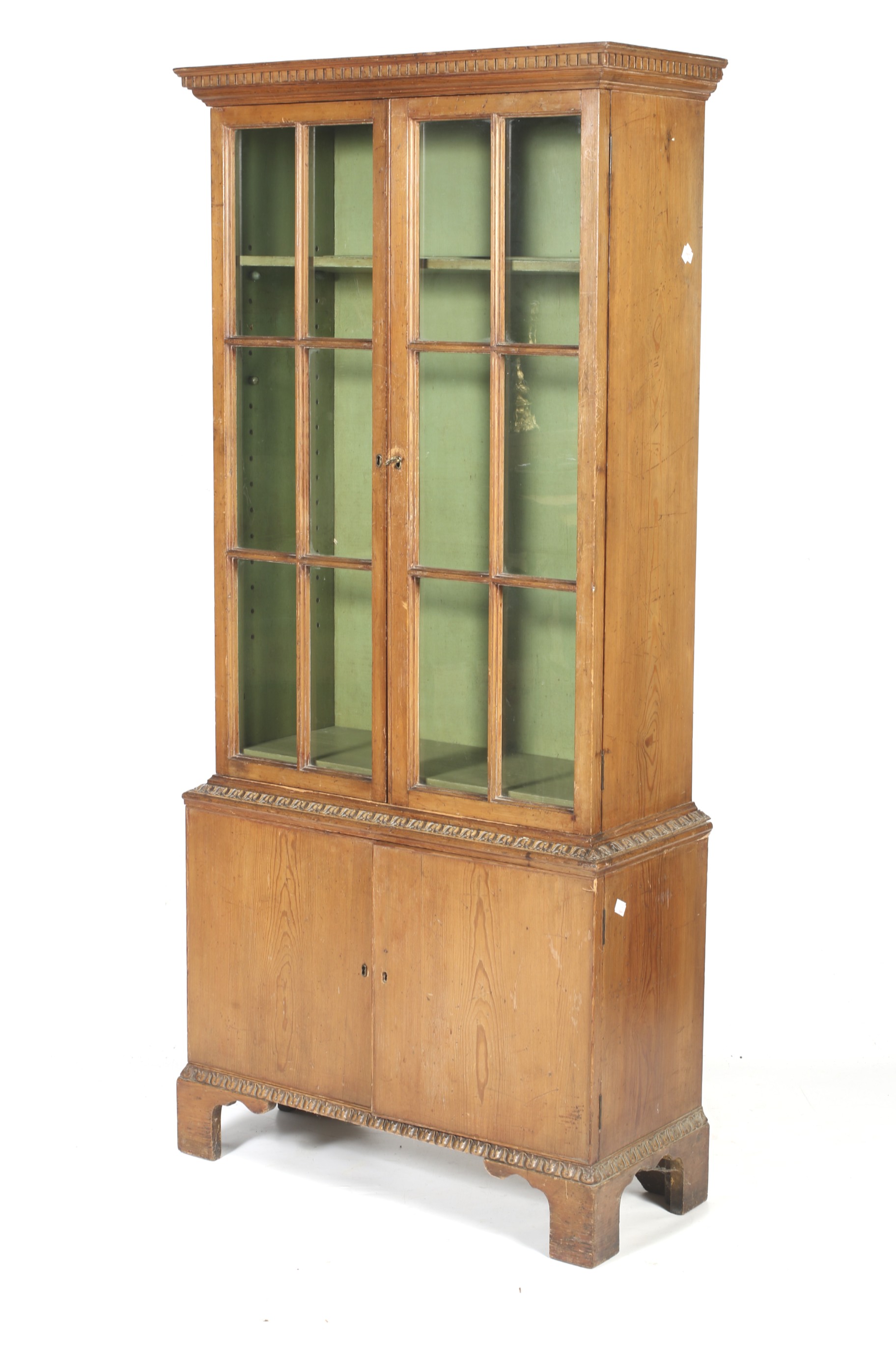 A vintage pine display cabinet.