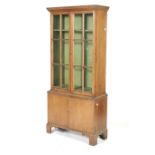 A vintage pine display cabinet.