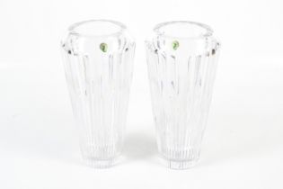 A pair of Waterford crystal 'Sun, Moon and Stars' vases.