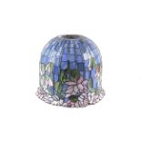 A large Tiffany style flowering lotus lampshade in blue and pink.