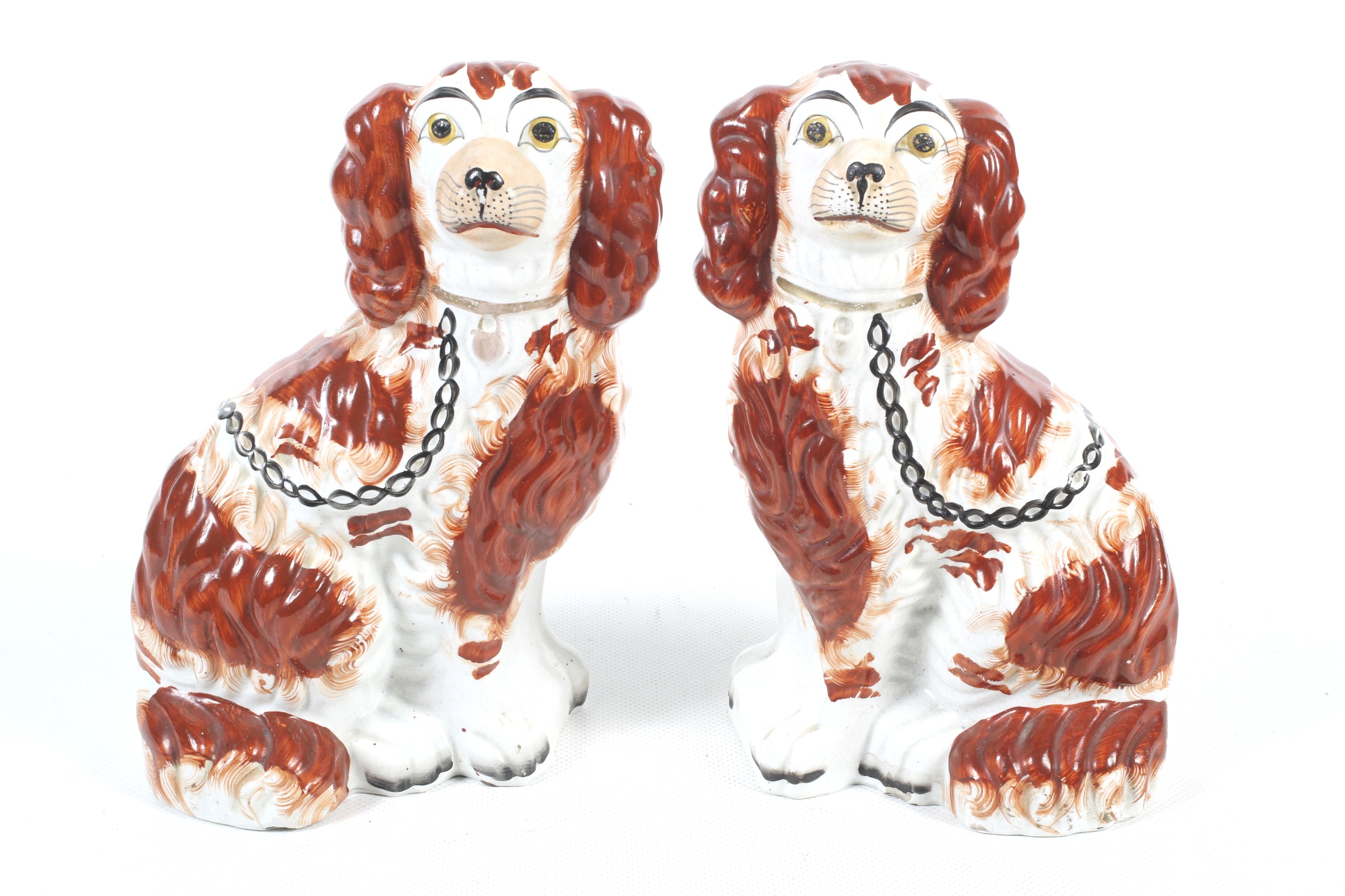A pair of 19th century Staffordshire spaniels.