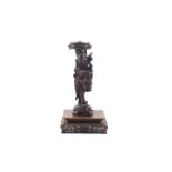 An early/mid-20th century Chinese carved rosewood immortal figure on stand.