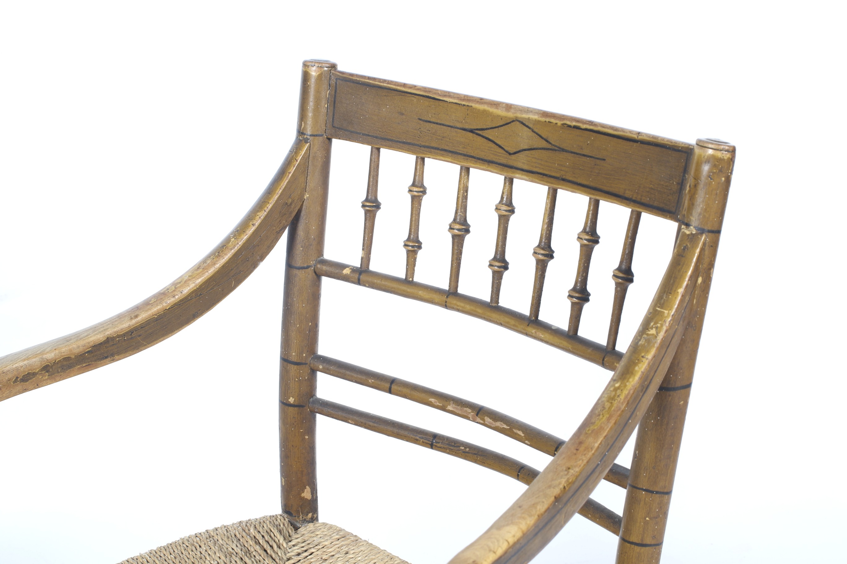 A 19th century faux bamboo chair. Painted and with carved decoration and a rush work seat. - Image 2 of 2