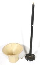 A black painted standard lamp.