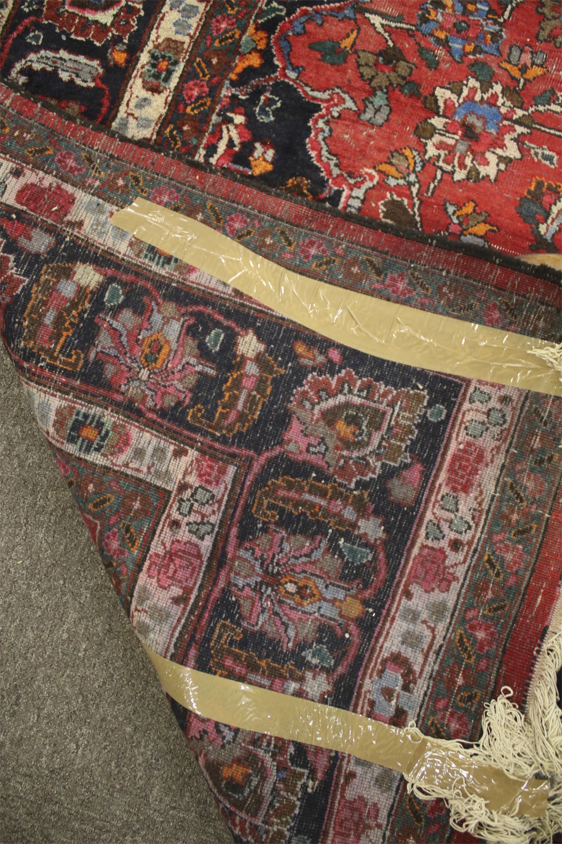 A large Persian Bakhtiari style wool carpet rug. - Image 3 of 3