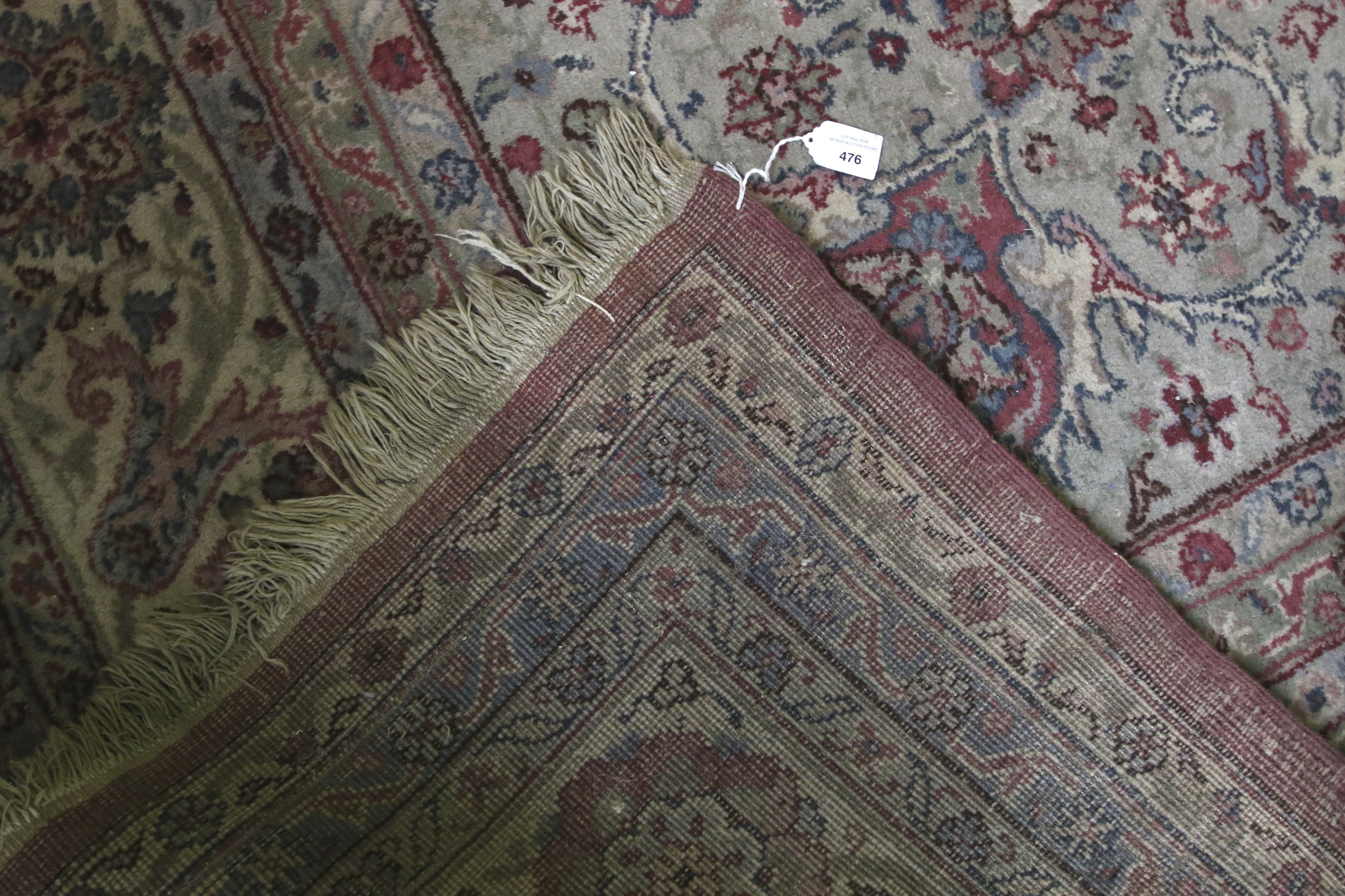 A large Persian rug. - Image 4 of 15