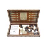 An Egyptian backgammon set and games box.